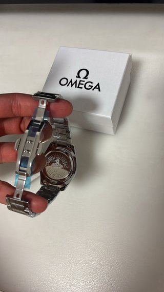 Reloj Omega Azul y Plateado