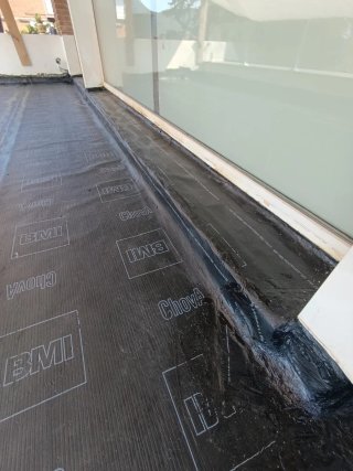 Trabajos de tela asfáltica