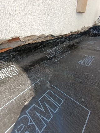 Trabajos de tela asfáltica