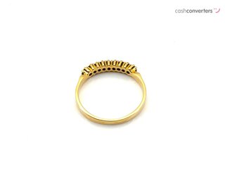 anillo oro 18k con piedra con diamante