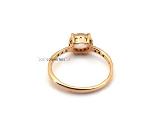sortija oro 18k con piedra con diamante,cuarzo