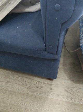 Butaca orejera con funda gris