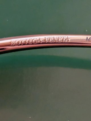 Gafas de sol Bottega Veneta mujer negras y doradas