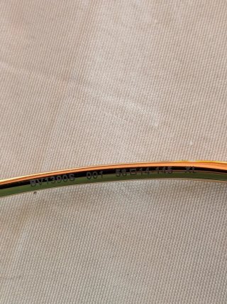 Gafas de sol Bottega Veneta mujer negras y doradas
