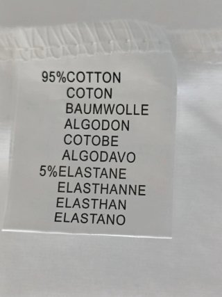T-shirt bianca con fiocco vita