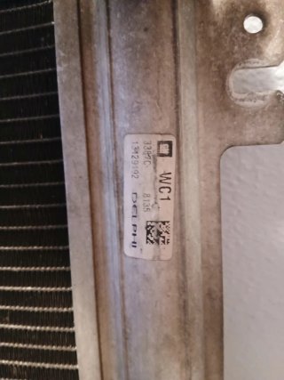 Radiador A/C Opel Astra H 1.9 CDTI