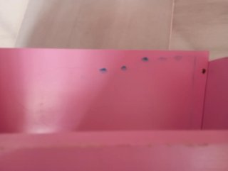 Cuna de juguete rosa para muñecos
