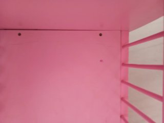Cuna de juguete rosa para muñecos