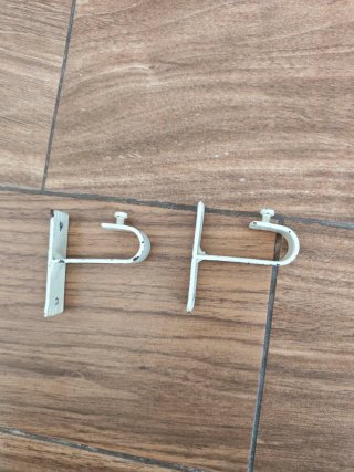 Soportes para cortinas de metal