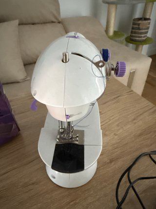 Máquina de coser portátil