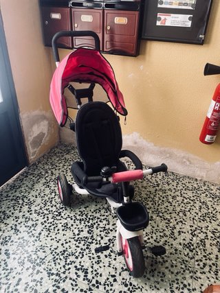Triciclo infantil rosa y blanco