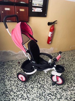 Triciclo infantil rosa y blanco