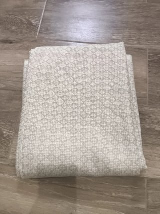 Retal de tela beige y blanco