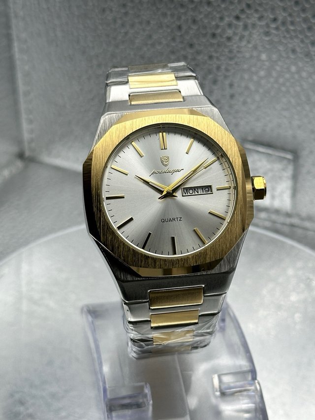 Reloj Poedagar dorado y plateado