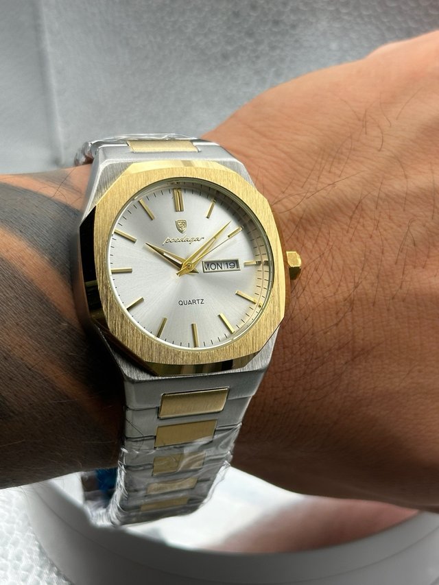 Reloj Poedagar dorado y plateado
