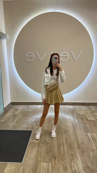 Falda plisada beige