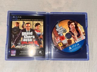 PS4 slim  Negra + Mando + Juegos + Cables