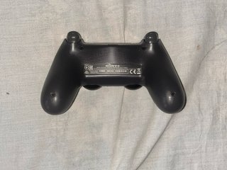 PS4 slim  Negra + Mando + Juegos + Cables
