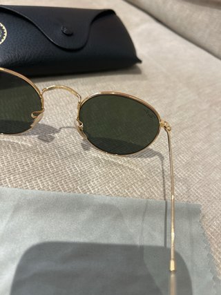 Gafas de sol Ray-Ban doradas y verdes
