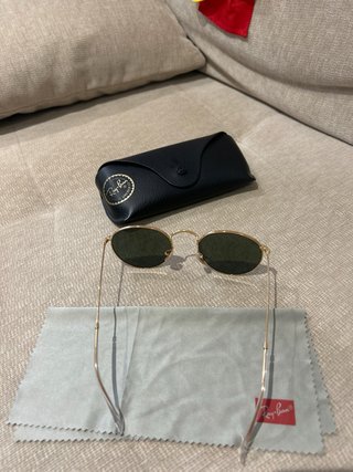 Gafas de sol Ray-Ban doradas y verdes