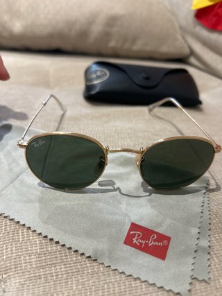 Gafas de sol Ray-Ban doradas y verdes