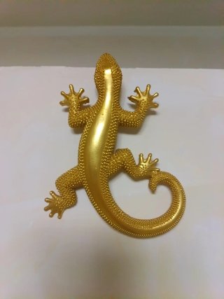Geco dorato decorativo