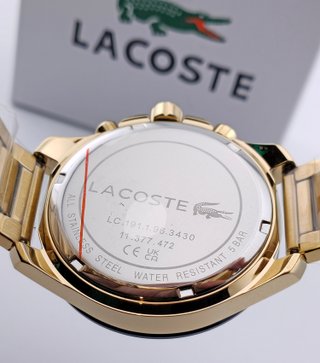 Reloj Lacoste nuevo, dorado y azul