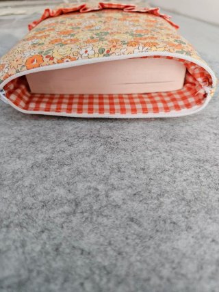 Funda libro floral naranja y amarillo