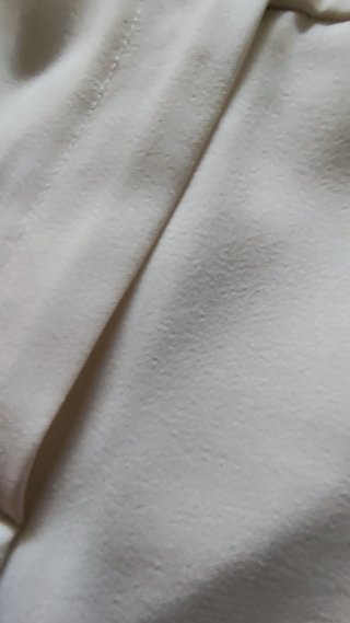 Chaqueta de traje blanca y pantalón a juego