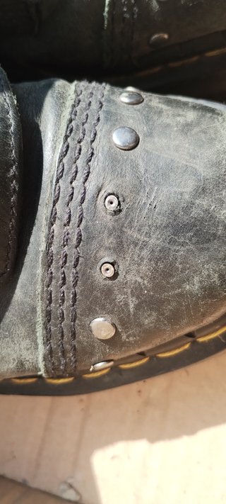 Dr. Martens Scarponi Neri con Fibbie