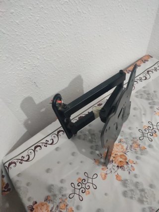 Soporte de pared para TV negro
