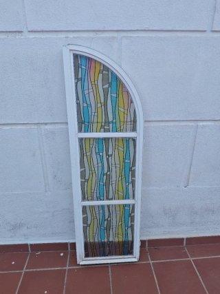 Ventana de arco con dos hojas