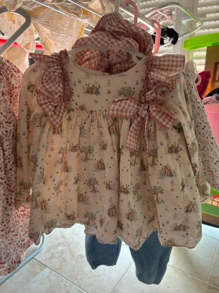 Vestido rosa bebé con volantes