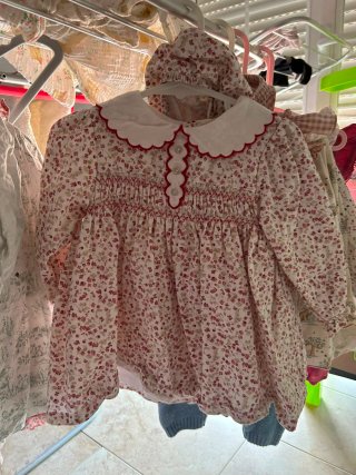 Vestido rosa bebé con volantes