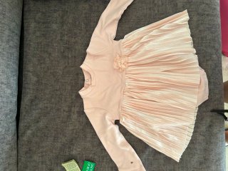 Vestido rosa bebé con volantes