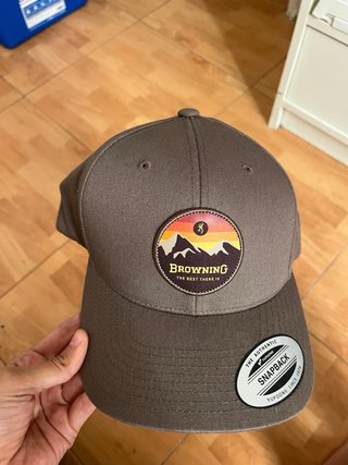 Gorra RH gris y dorada