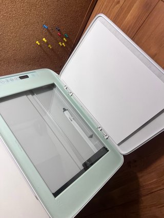 Impresora HP verde y blanca