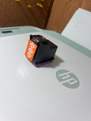 Impresora HP verde y blanca