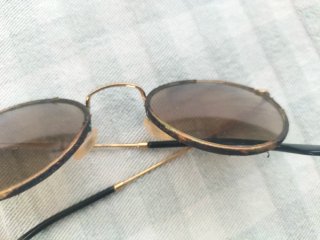 Gafas de sol Ray-Ban redondas doradas