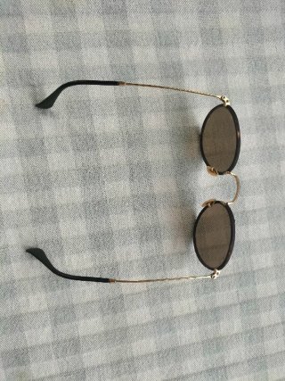 Gafas de sol Ray-Ban redondas doradas