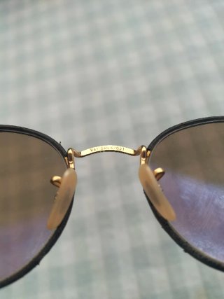 Gafas de sol Ray-Ban redondas doradas
