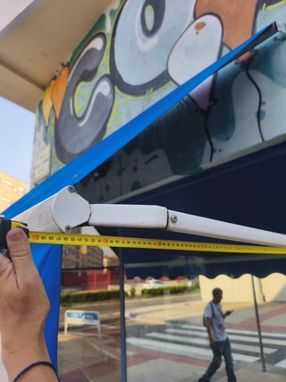 Toldo azul de exterior
