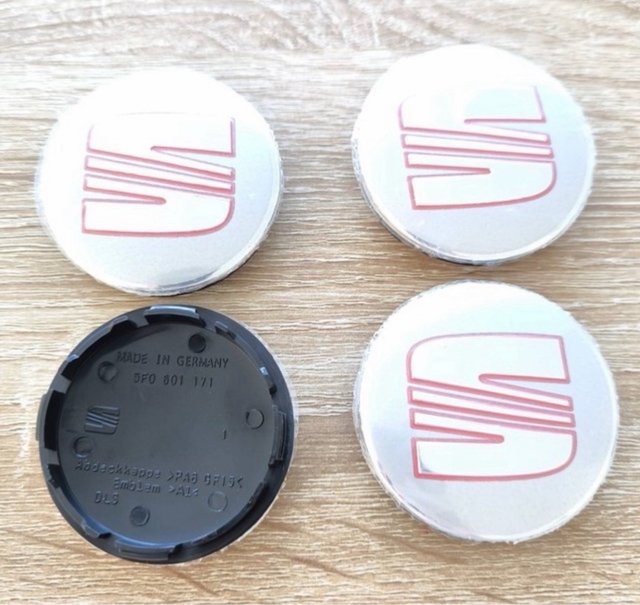 Tapabujes Seat 56mm (4 unidades)