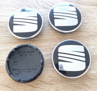 Tapabujes Seat 56mm (4 unidades)