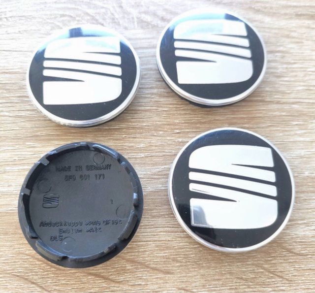 Tapabujes Seat 56mm (4 unidades)