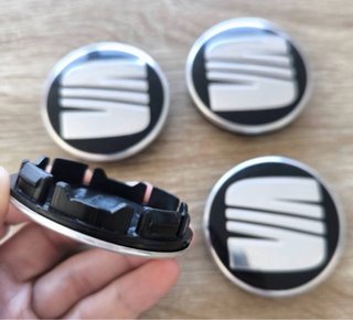 Tapabujes Seat 56mm (4 unidades)