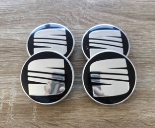 Tapabujes Seat 56mm (4 unidades)