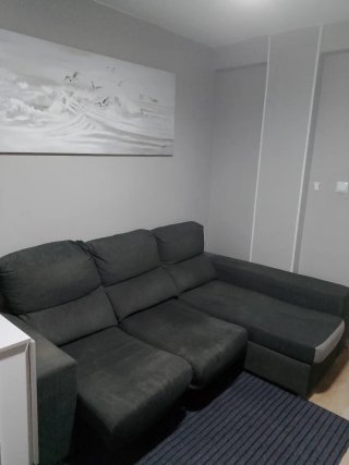 Sofá modular gris de tela