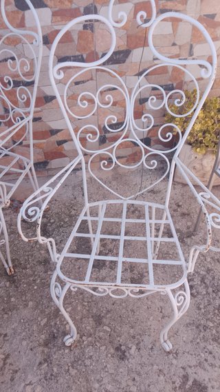 Mesa y 4 sillas de hierro para jardín