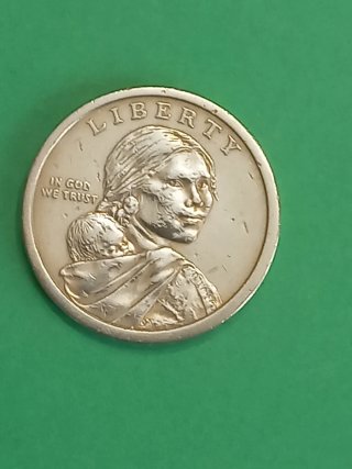 Moneda In God We Trust con mujer y bebé 1 dolar.